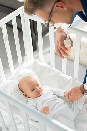 Как выбрать кровать для новорожденного